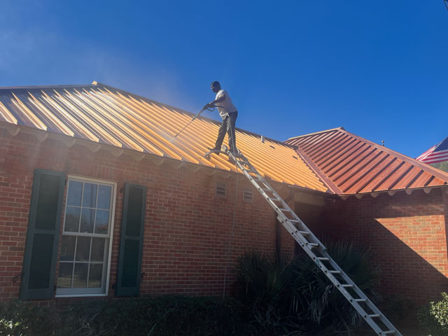 Pressure washing a steel roof